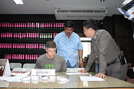 Police question Simon Hall about what they allegedly found in his apartment.